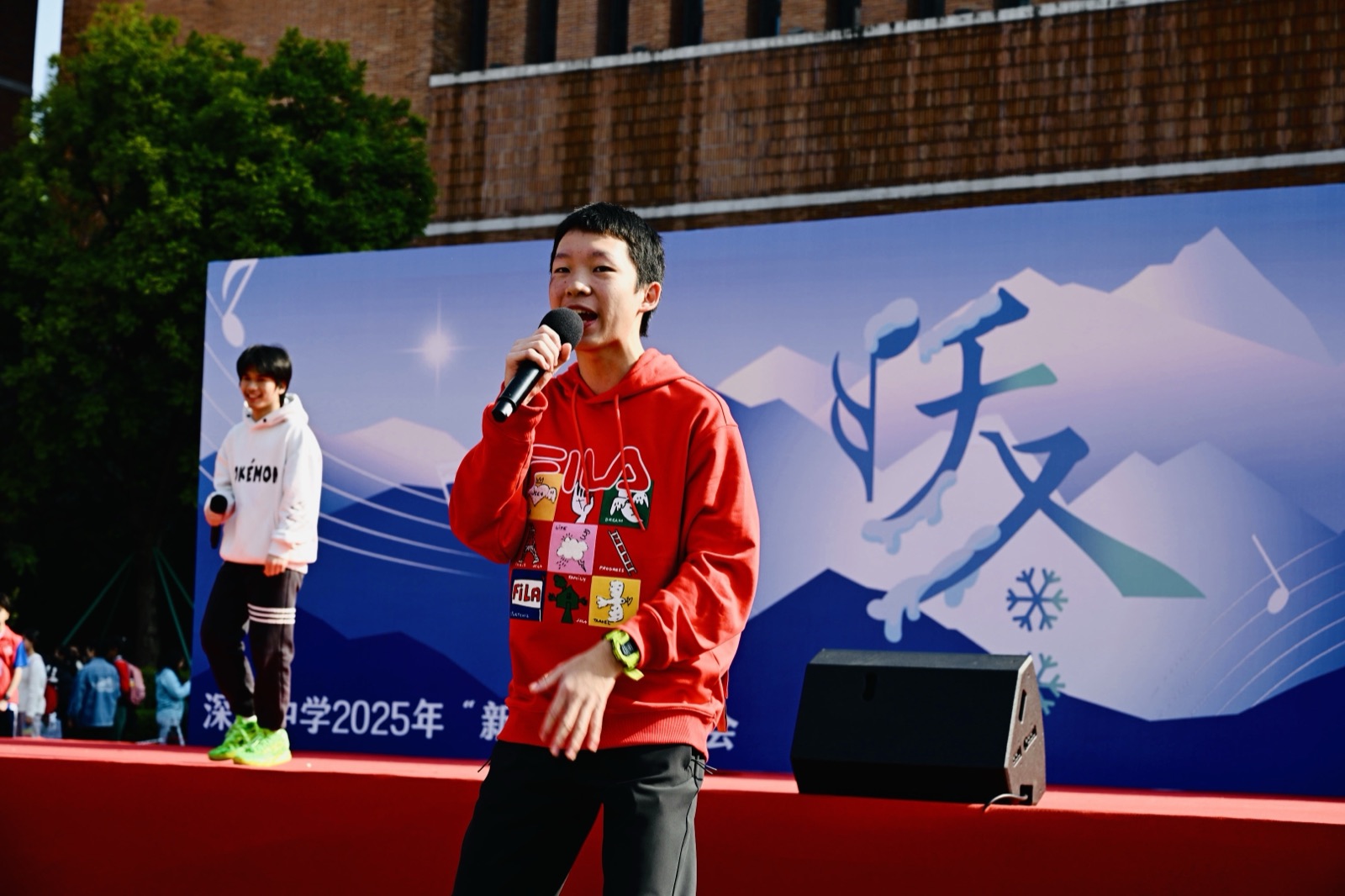 Ben performing on stage